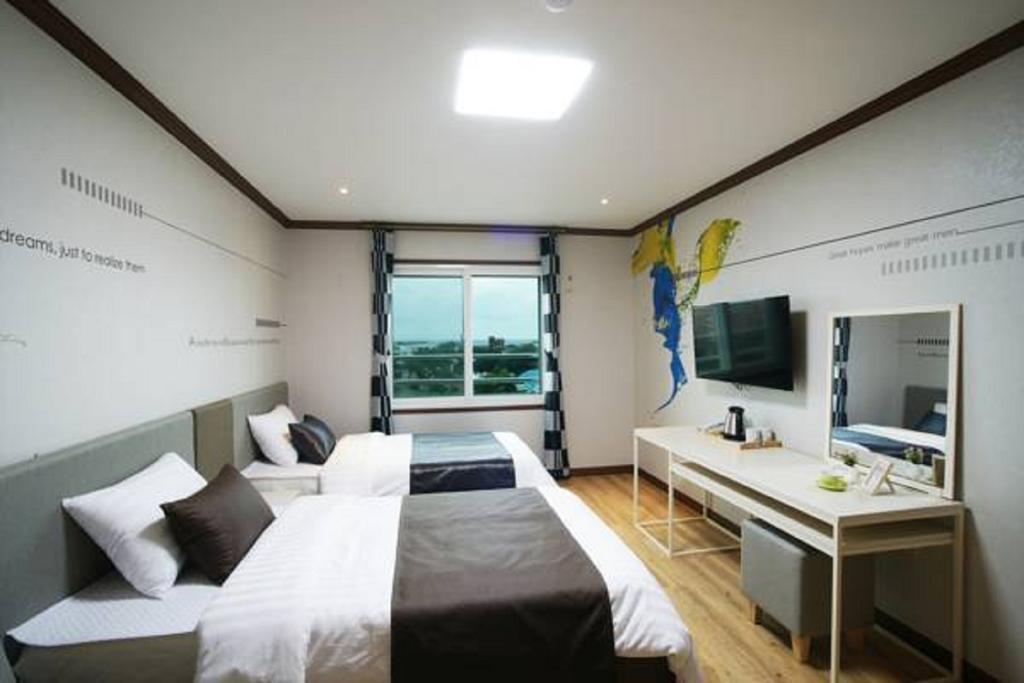 Seongsan Aqua Beach Hotel Seogwipo Chambre photo