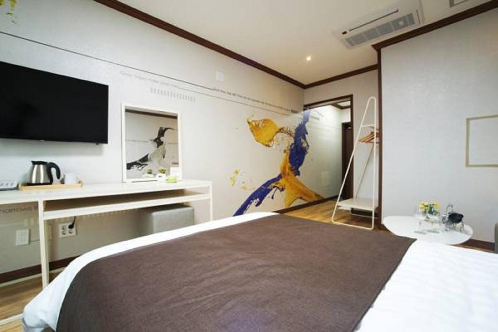 Seongsan Aqua Beach Hotel Seogwipo Chambre photo