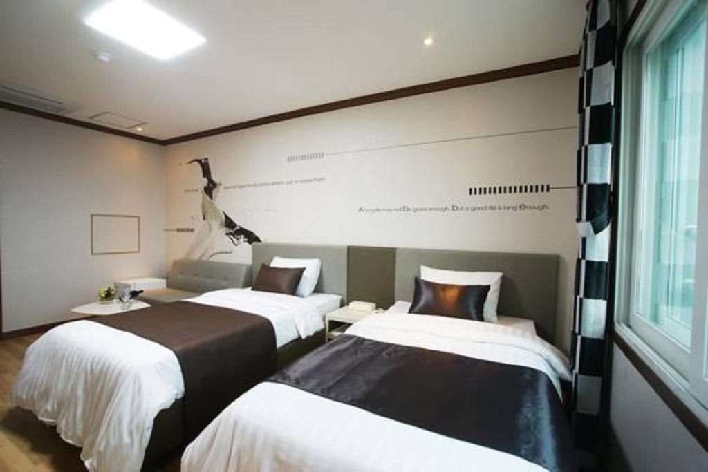 Seongsan Aqua Beach Hotel Seogwipo Chambre photo